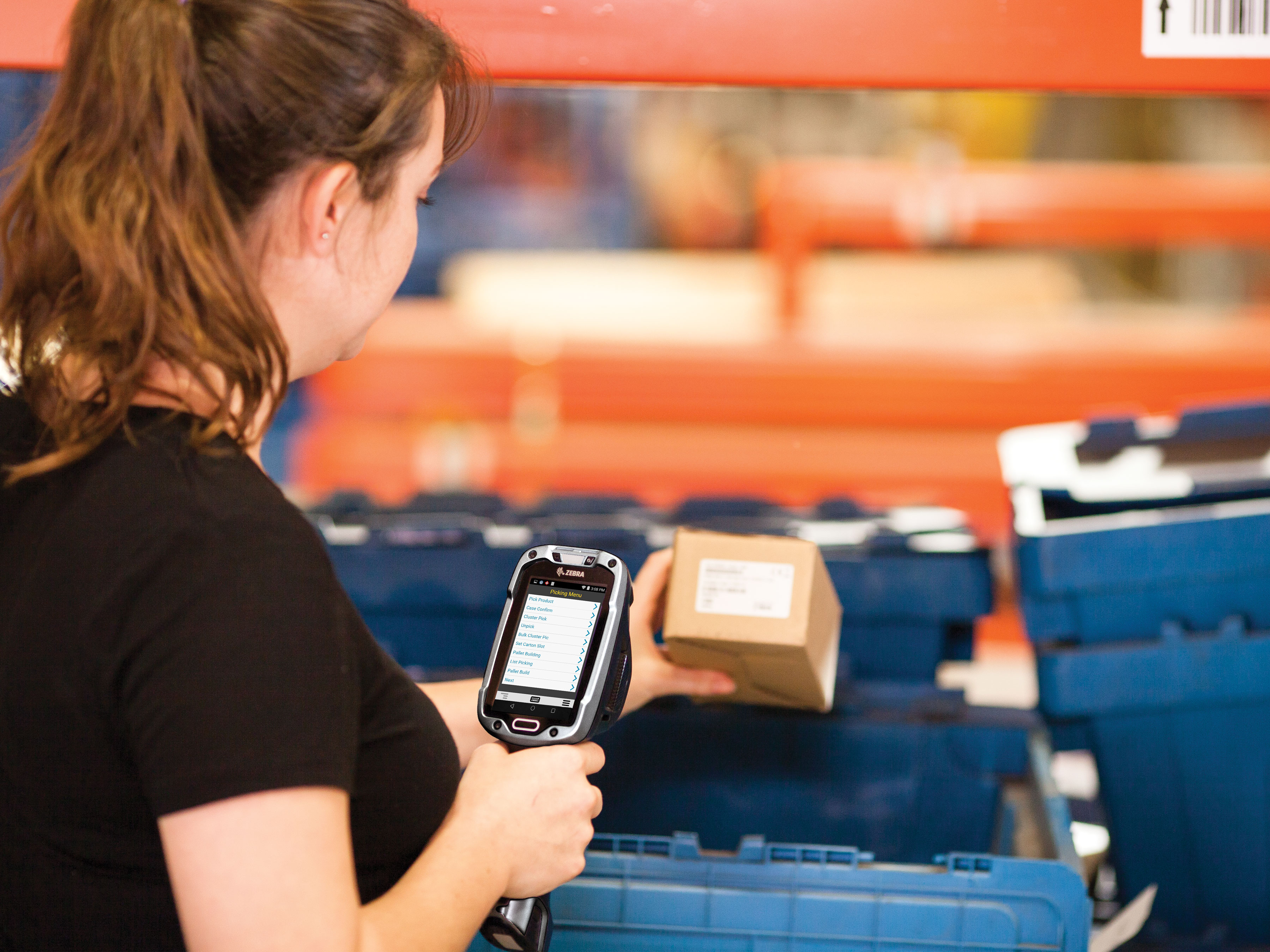 Employee scanning an item with Zebra device