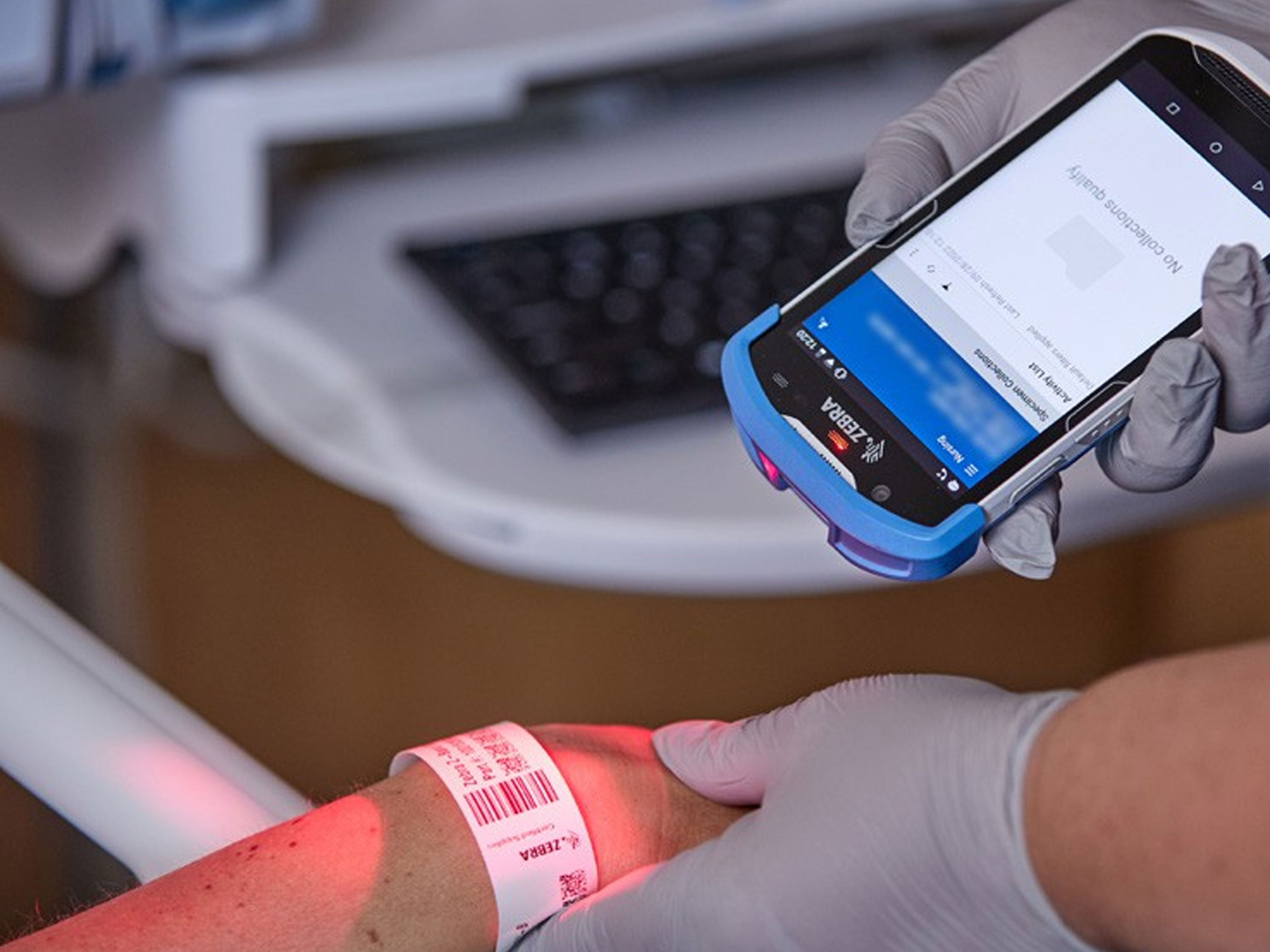 Nurse scanning patient's wristband