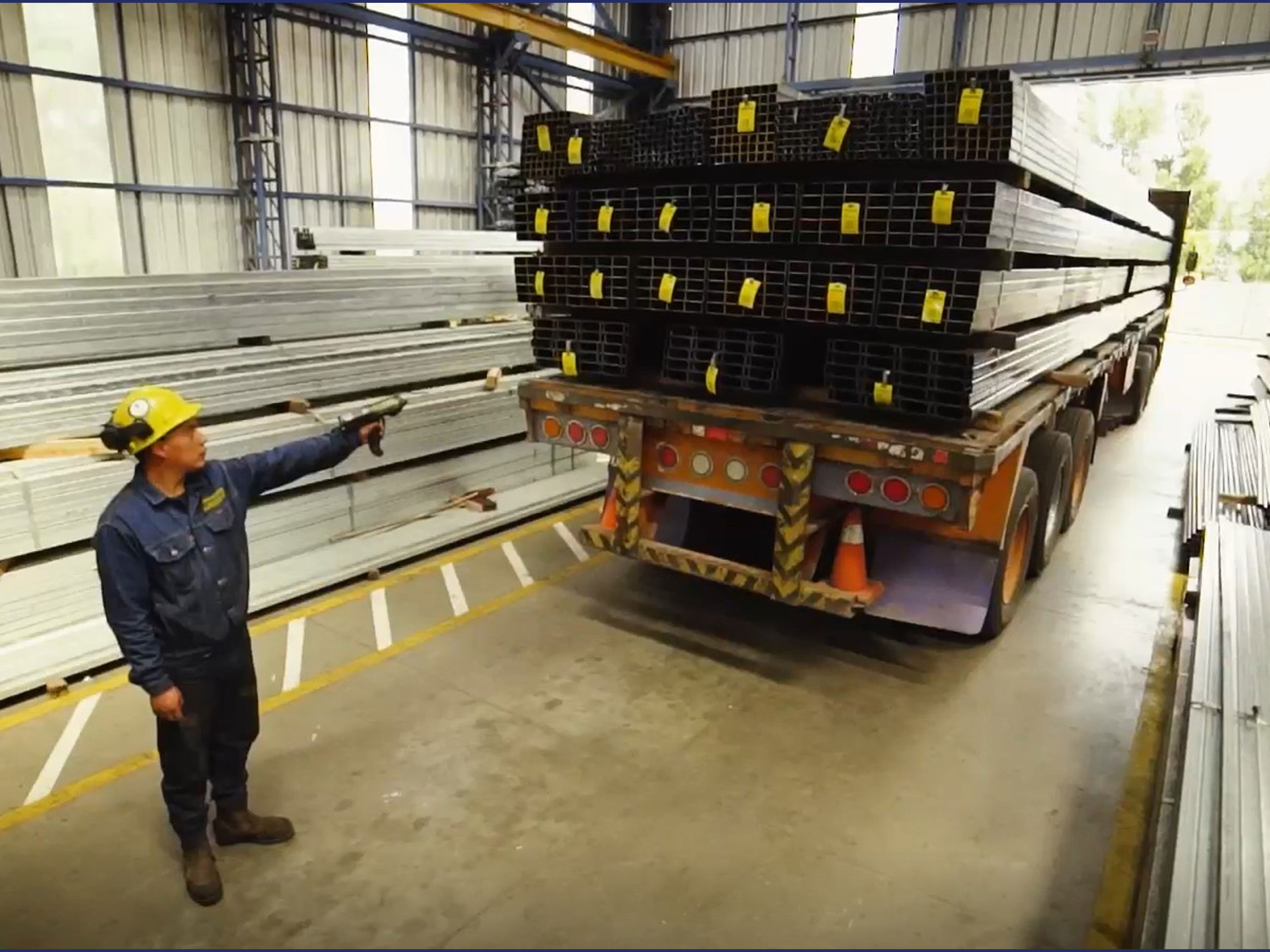 Man scanning truck of items