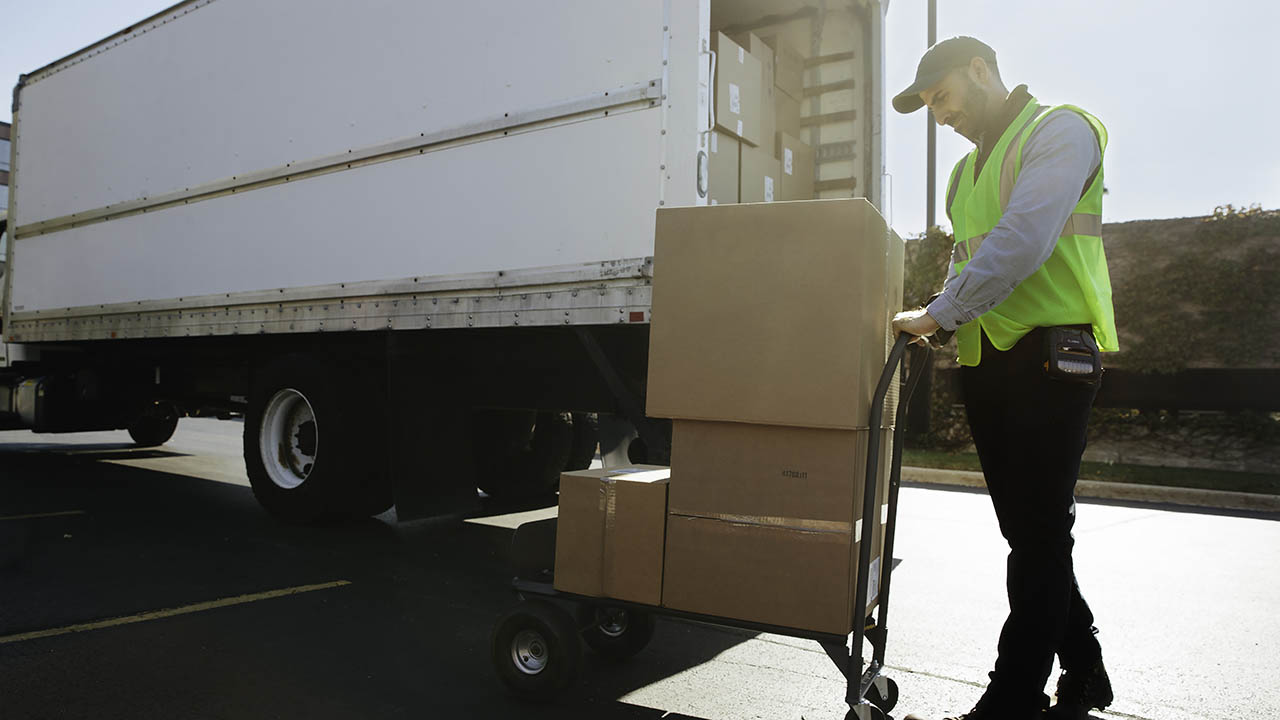 Delivery Driver Unloading Boxes - Blog