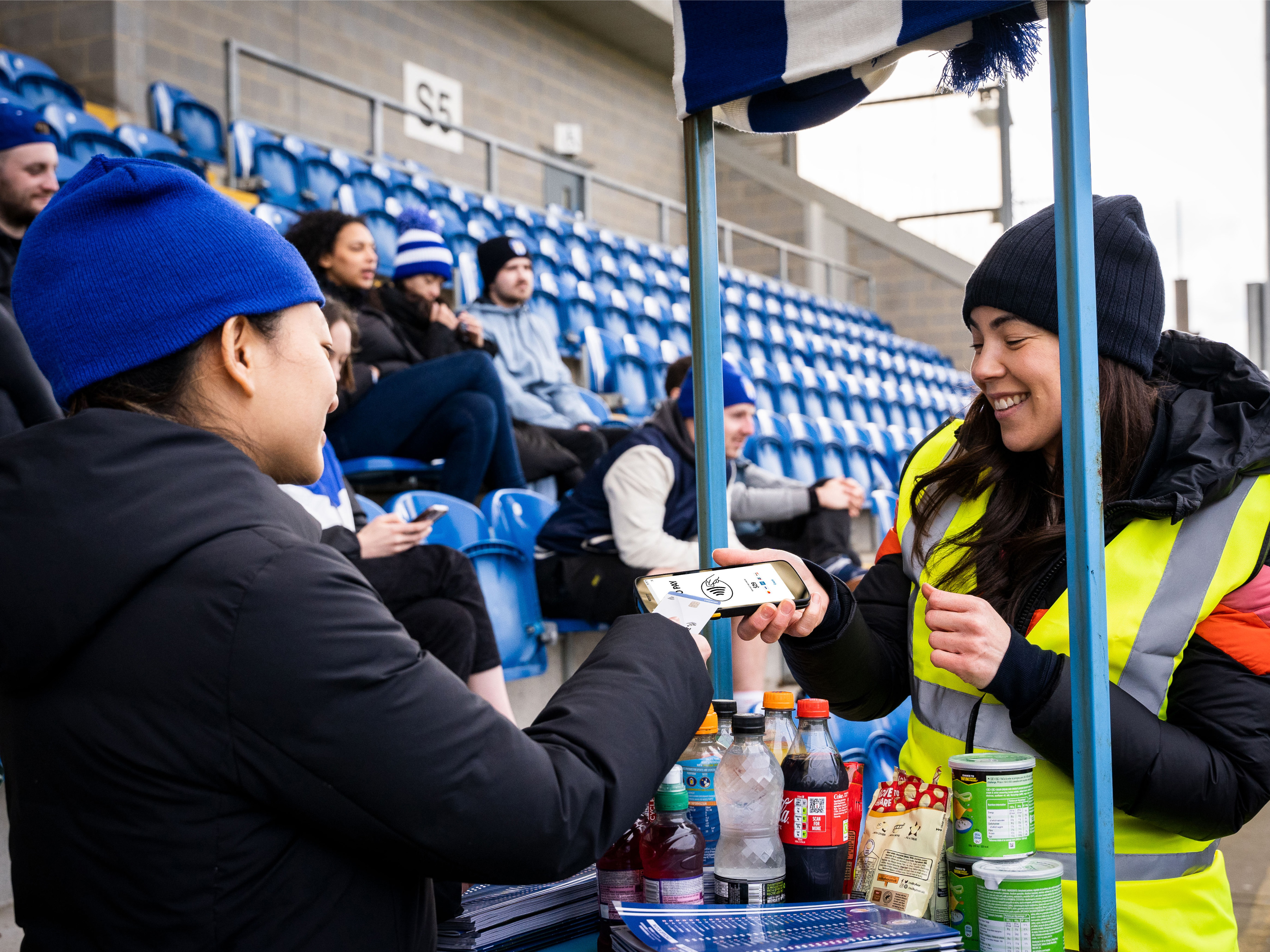 Sports fan at a concession stand inside a stadium